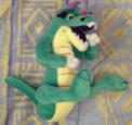 Peluche d'un dragon vert