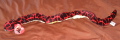 serpent rouge en peluche